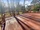 Step out onto this expansive deck and enjoy the private backyard at 13943 Dannemara Dr, Pineville, NC 28134