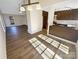 Sun-drenched dining area with kitchen access and hardwood floors at 13943 Dannemara Dr, Pineville, NC 28134