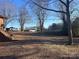 Large backyard with space for outdoor activities at 1401 Chelveston Dr, Charlotte, NC 28208