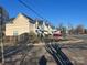 Row of new construction homes in a residential neighborhood at 1401 Chelveston Dr, Charlotte, NC 28208