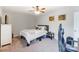 Bright bedroom with a double bed and ceiling fan at 1605 Merry Oaks Rd # E, Charlotte, NC 28205