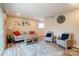 Living room with neutral colored couch and chairs at 1605 Merry Oaks Rd # E, Charlotte, NC 28205