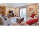 Living room with sliding door to balcony at 1605 Merry Oaks Rd # E, Charlotte, NC 28205