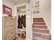 Staircase with coat closet and built-in storage at 1605 Merry Oaks Rd # E, Charlotte, NC 28205