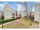 View of community courtyard and beautiful landscaping from upper level at 1605 Merry Oaks Rd # E, Charlotte, NC 28205