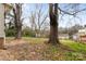 Large backyard with mature trees and shed at 2209 Donnabrook Ln, Gastonia, NC 28052