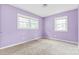 Bright bedroom with double windows and carpeted floor at 2209 Donnabrook Ln, Gastonia, NC 28052