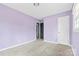 Simple bedroom with a closet and door to hallway at 2209 Donnabrook Ln, Gastonia, NC 28052