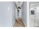 Long hallway with carpeted flooring and doors leading to other rooms at 2209 Donnabrook Ln, Gastonia, NC 28052