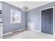 Small kitchen features a window, door, and linoleum floor at 2209 Donnabrook Ln, Gastonia, NC 28052