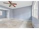 Spacious living room with light blue walls and carpet at 2209 Donnabrook Ln, Gastonia, NC 28052