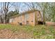 Brick home with deck and wooded backyard at 2209 Donnabrook Ln, Gastonia, NC 28052