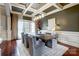 Elegant dining room with hardwood floors and coffered ceiling at 252 Bay Shore Loop, Mooresville, NC 28117