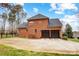 Brick house with two-car garage and driveway at 252 Bay Shore Loop, Mooresville, NC 28117