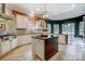 Kitchen with breakfast nook and dark green accent wall at 252 Bay Shore Loop, Mooresville, NC 28117