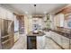 Eat-in kitchen with an island and view to backyard at 252 Bay Shore Loop, Mooresville, NC 28117