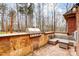 Built-in outdoor kitchen with seating area at 252 Bay Shore Loop, Mooresville, NC 28117