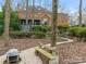 Brick house with deck and pathway through backyard at 2540 Ballencourt Ln, Charlotte, NC 28226