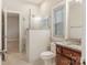 Bathroom with walk-in shower and granite vanity at 2540 Ballencourt Ln, Charlotte, NC 28226