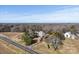 Aerial view of farmhouse, barn, and surrounding land at 2948 W Main St, Claremont, NC 28610