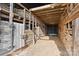 Spacious barn interior with hayloft and stalls at 2948 W Main St, Claremont, NC 28610