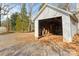 Detached garage with open structure and space for storage at 2948 W Main St, Claremont, NC 28610