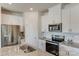 Modern kitchen with stainless steel appliances and island at 3021 Belstock Ct, Charlotte, NC 28216