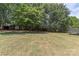 Wide shot of the backyard, with a shed and a trampoline in view at 3035 Agean Ln, York, SC 29745