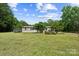 Spacious fenced backyard featuring an exterior view of the home at 3035 Agean Ln, York, SC 29745