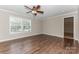 Spacious bedroom featuring hardwood floors, neutral walls, ceiling fan and ample natural light at 3035 Agean Ln, York, SC 29745