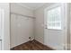 A mud room with wire shelving, a wooden door to the backyard, and light-colored walls at 3035 Agean Ln, York, SC 29745