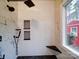 Spa-like bathroom with marble walls, pebble floor, and modern fixtures at 3119 Drake Ln, Monroe, NC 28110