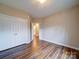 Spacious bedroom with double doors and hardwood flooring at 3119 Drake Ln, Monroe, NC 28110