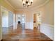 Open dining room with views of the living room and kitchen at 3119 Drake Ln, Monroe, NC 28110