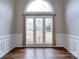 Bright dining room with hardwood floors and large windows at 3119 Drake Ln, Monroe, NC 28110