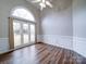 Spacious dining room with hardwood floors and large windows at 3119 Drake Ln, Monroe, NC 28110