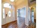 Bright and airy entryway with hardwood floors and views to the living room at 3119 Drake Ln, Monroe, NC 28110