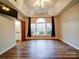 Main bedroom with hardwood floors and large windows at 3119 Drake Ln, Monroe, NC 28110