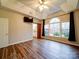 Main bedroom with hardwood floors and large windows at 3119 Drake Ln, Monroe, NC 28110