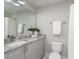 Clean bathroom featuring a granite countertop, a sink, and modern fixtures at 315 Arlington Ave # 604, Charlotte, NC 28203