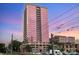 Striking high-rise building with a modern glass facade and multiple balconies offering city views at 315 Arlington Ave # 604, Charlotte, NC 28203