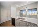 Well-equipped kitchen with a dishwasher and a great view of the city at 315 Arlington Ave # 604, Charlotte, NC 28203