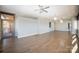 Spacious living area with hardwood floors and a walk-out balcony, perfect for entertaining at 315 Arlington Ave # 604, Charlotte, NC 28203