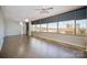 Spacious living space with hardwood floors, great natural lighting, and stunning city views at 315 Arlington Ave # 604, Charlotte, NC 28203