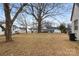 Spacious backyard with mature trees and ample green space at 315 W 2Nd St, Cherryville, NC 28021