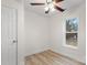 Bright bedroom with wood flooring and ceiling fan at 315 W 2Nd St, Cherryville, NC 28021