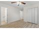 Hardwood floor bedroom with double doors leading to the bathroom at 315 W 2Nd St, Cherryville, NC 28021