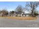 Charming house with grey brick exterior and front yard at 315 W 2Nd St, Cherryville, NC 28021