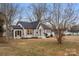 Charming house with grey brick exterior and front yard at 315 W 2Nd St, Cherryville, NC 28021