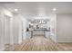 Modern kitchen with white cabinets, granite counters, and chandelier at 315 W 2Nd St, Cherryville, NC 28021